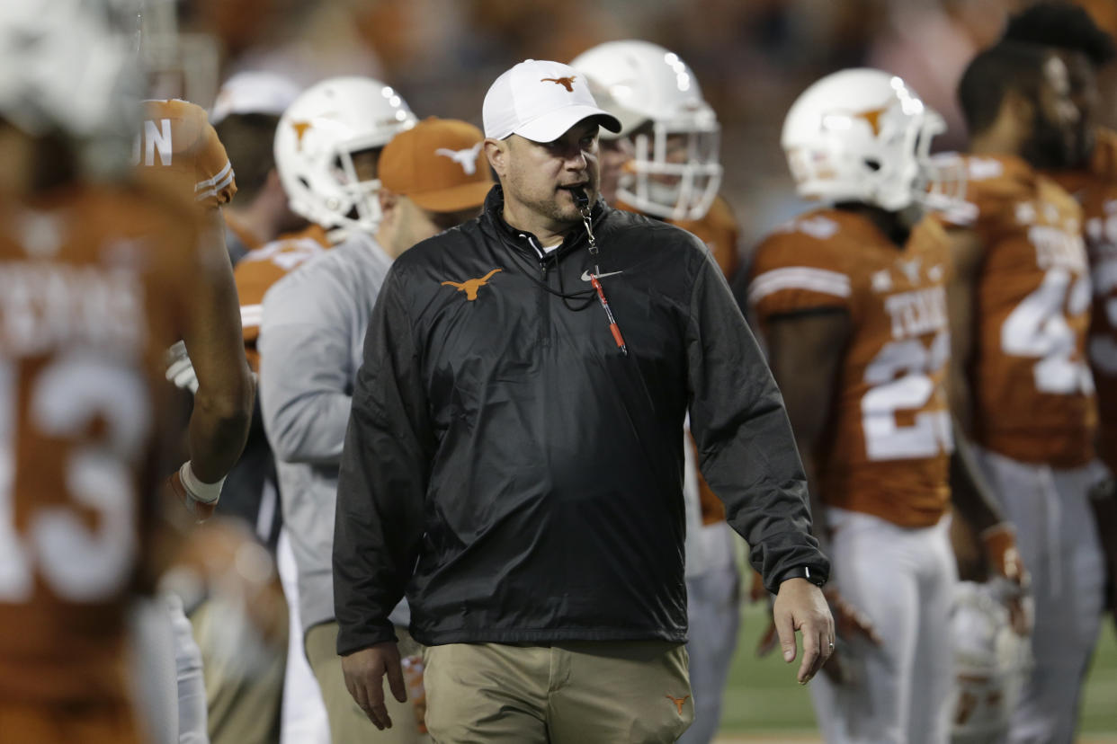 Texas coach Tom Herman said he will cooperate with the NCAA if it wants to investigate his trip to a Miami strip club with ex-Ohio State assistant Zach Smith, and that his wife was OK with him being there. (Getty Images)