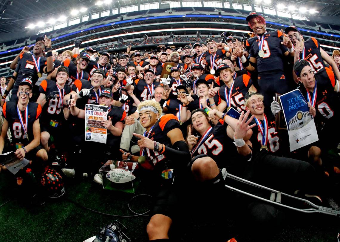 The Aledo Bearcats celebrate their championship win of a UIL Class 5A D1 state championship football game at AT&T Stadium in Arlington, Texas, Saturday, Dec. 16, 2022. The Aledo Bearcats defeated The College Station Cougars 52-14. (Star-Telegram Bob Booth)