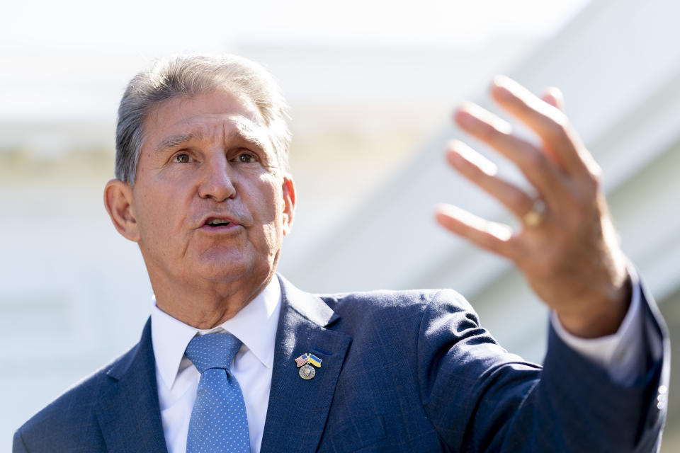 FILE - Sen. Joe Manchin, D-W.Va., speaks to reporters outside the West Wing of the White House in Washington, Aug. 16, 2022, after President Joe Biden signed the Democrats' landmark climate change and health care bill. Manchin made a deal with Democratic leaders as part of his vote pushing the party's highest legislative priority across the finish line last month. Now, he's ready to collect. But many environmental advocacy groups and lawmakers are balking. (AP Photo/Andrew Harnik, File)