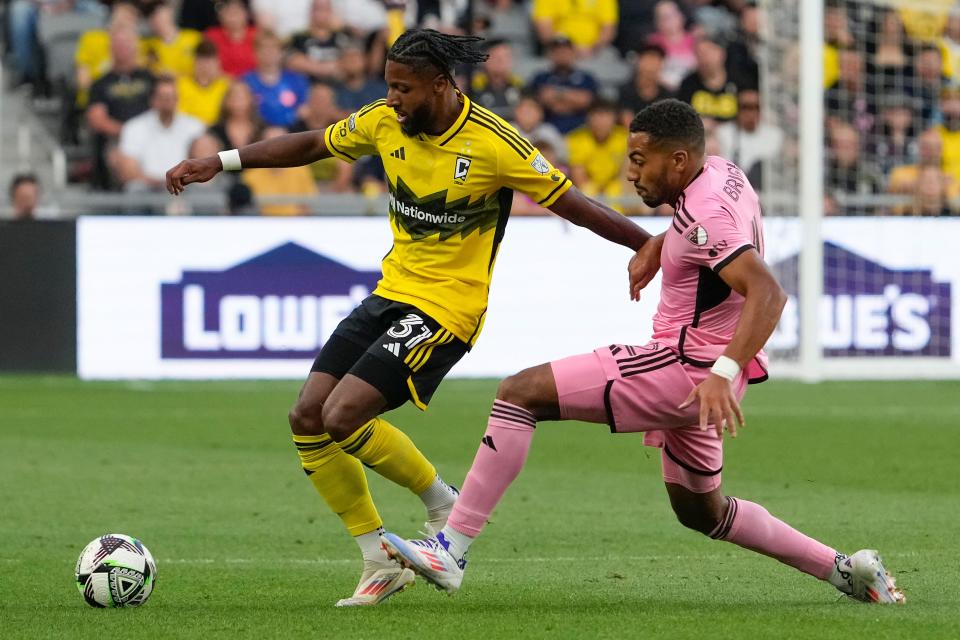 Aug 13, 2024; Columbus, Ohio, USA; Columbus Crew defender Steven Moreira (31) dribbles past Inter Miami CF defender Yannick Bright (42) during the Leagues Cup round of 16 game at Lower.com Field. The Crew won 3-2.