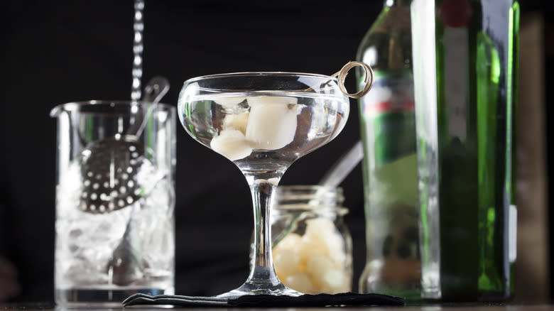 martini in front of green bottles