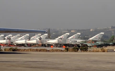 A general view shows Russian fighter jets on the tarmac at the Russian Hmeimim military base in Latakia in 2016 - Credit: AFP/Getty Images