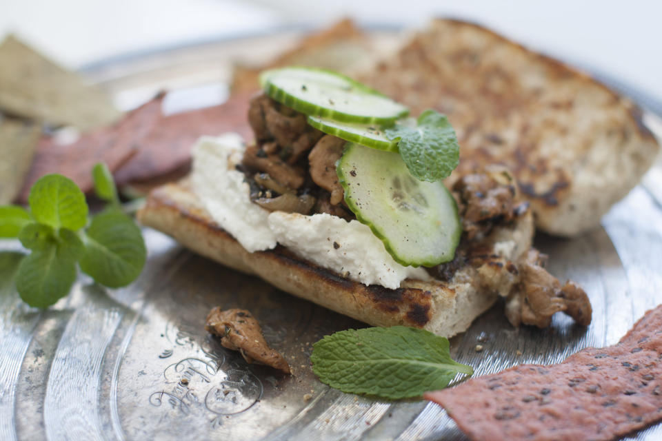 This March 24, 2014 photo shows minted lemon and olive chicken wraps in Concord, N.H. (AP Photo/Matthew Mead)