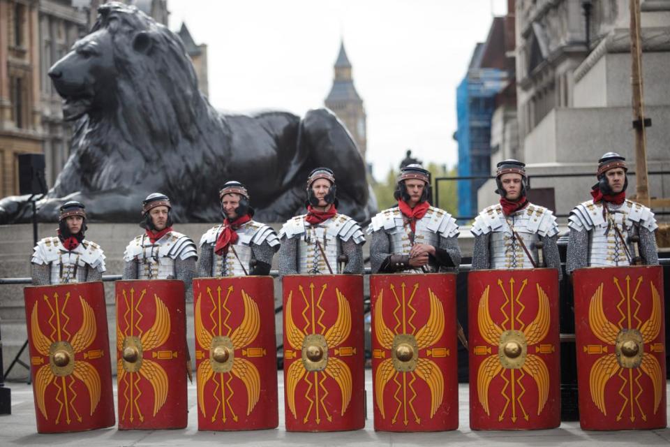 Actors dressed as Roman Legionaries in Trafalgar Square (Getty)