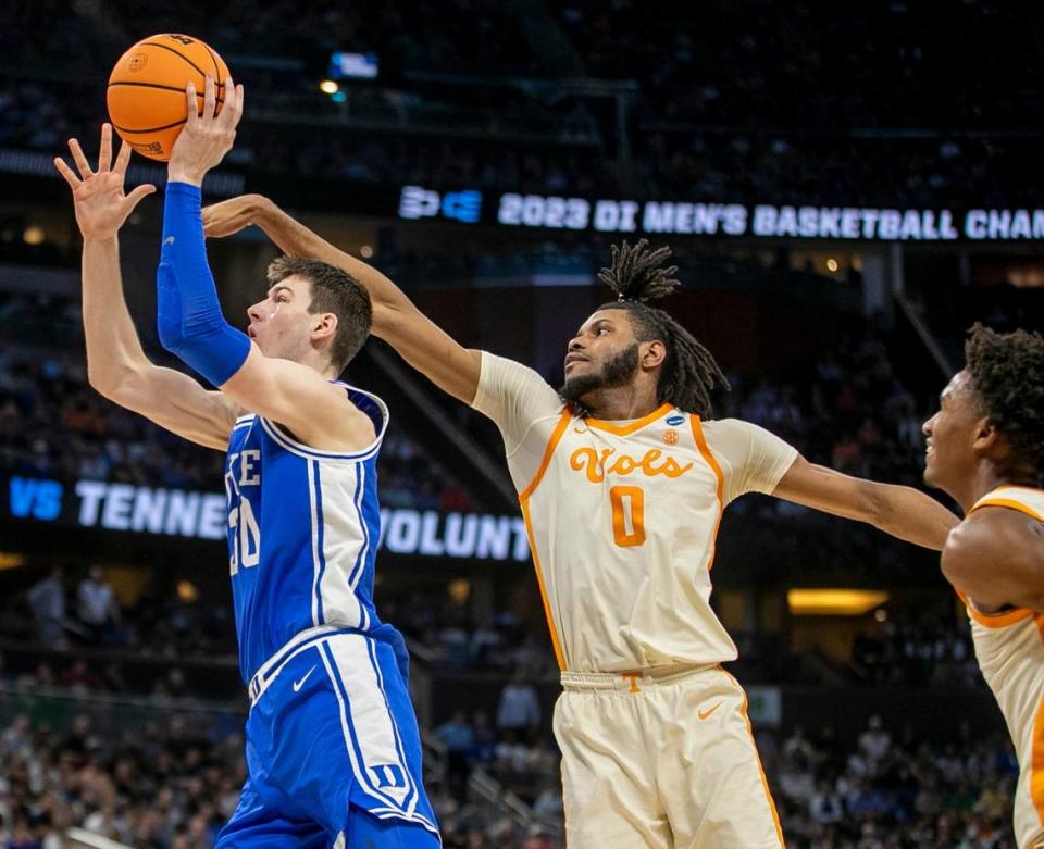 Duke’s Kyle Filipowski (30) breaks to the basket against Tennessee’s Jonas Aidoo (0) in the first half during the second round of the NCAA Tournament on Saturday, March 18, 2023 at the Amway Center in Orlando, Fla