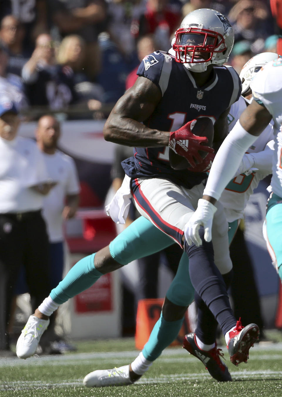 New England Patriots wide receiver Josh Gordon catches a pass against the Miami Dolphins during the first half of an NFL football game, Sunday, Sept. 30, 2018, in Foxborough, Mass. (AP Photo/Elise Amendola)