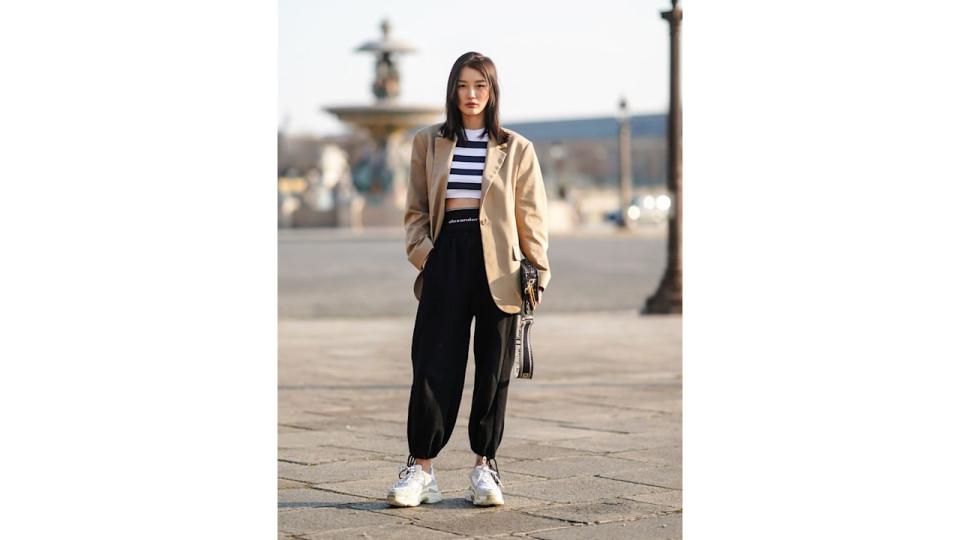 An oversize blazer in a light palette makes for ideal summer track pant style