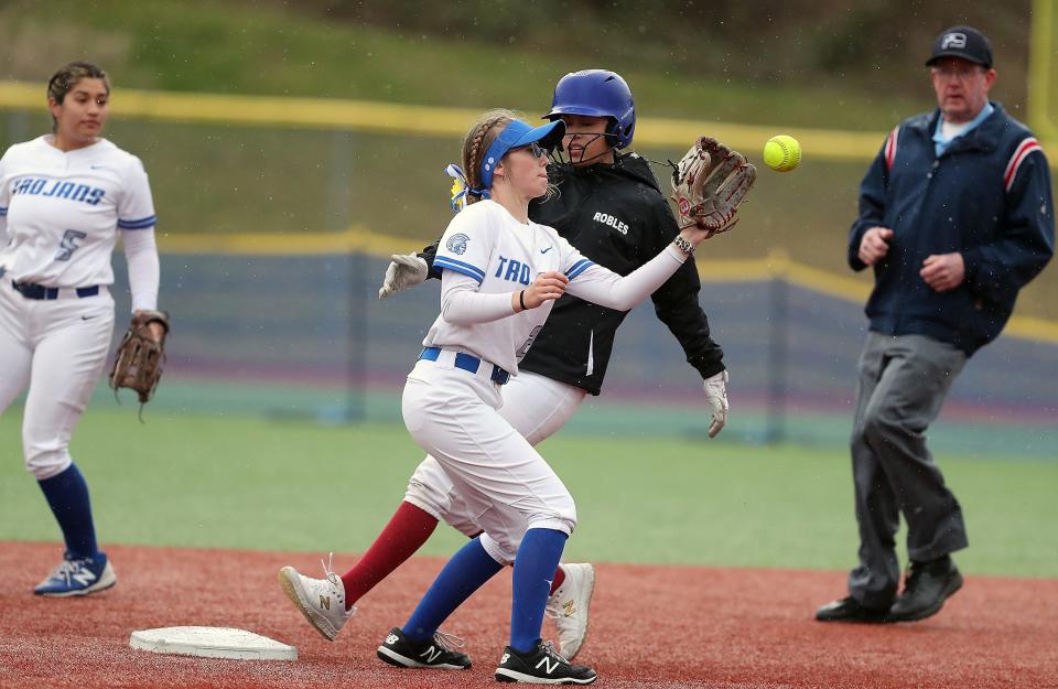 Kingston's Cadence Robles makes it to second ahead of Olympic's Hailey Feltis' catch during their game on Thursday, March 23, 2023. The game was postponed due to rain with Kingston ahead 4-1 in the third inning.