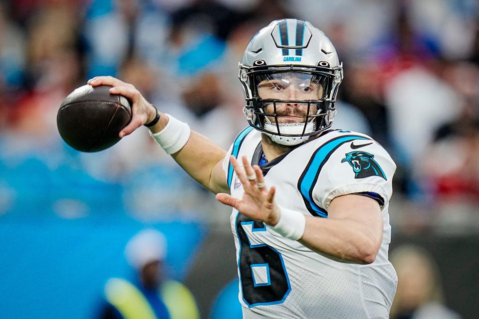 FILE - Carolina Panthers quarterback Baker Mayfield looks to pass during an NFL football game against the San Francisco 49ers, Oct. 9, 2022, in Charlotte, N.C. Mayfield has said he does not want to be traded and is trying his best to be supportive as the team's No. 2 quarterback behind starting P.J. Walker. (AP Photo/Rusty Jones, File)