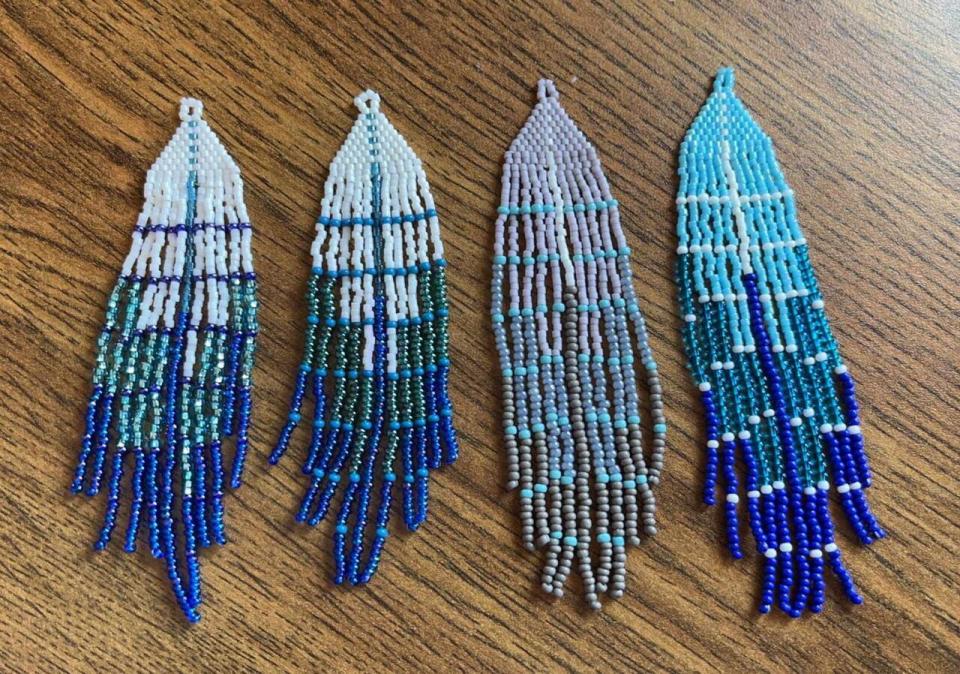 Haley Edmunds-Shiwak created two beaded scarves and four sets of earrings for the show Avatar: The Last Airbender. She was given guidelines on colours but two of the earrings are in Labrador colours. 