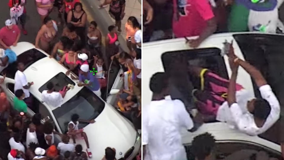 Pictures of the men on the car in the middle of the road at Daytona Beach, blocking traffic while people flock around the vehicle.