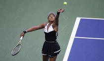 Naomi Osaka, of Japan, serves against Belinda Bencic, of Switzerland, during the fourth round of the US Open tennis championships Monday, Sept. 2, 2019, in New York. (AP Photo/Frank Franklin II)