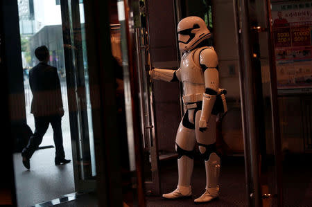 A fan dressed as a Storm Trooper from "Star Wars" reacts during Star Wars Day in Taipei, Taiwan May 4, 2017. REUTERS/Tyrone Siu