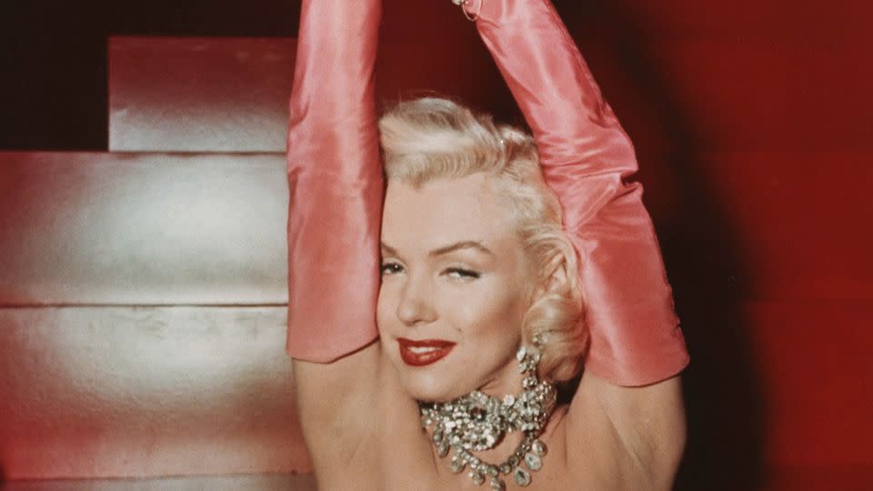 Marilyn Monroe created an iconic opera gloves moment, teaming them with a bustier dress in the 1953 movie "Gentlemen Prefer Blondes." - 20th Century Fox/Kobal/Shutterstock