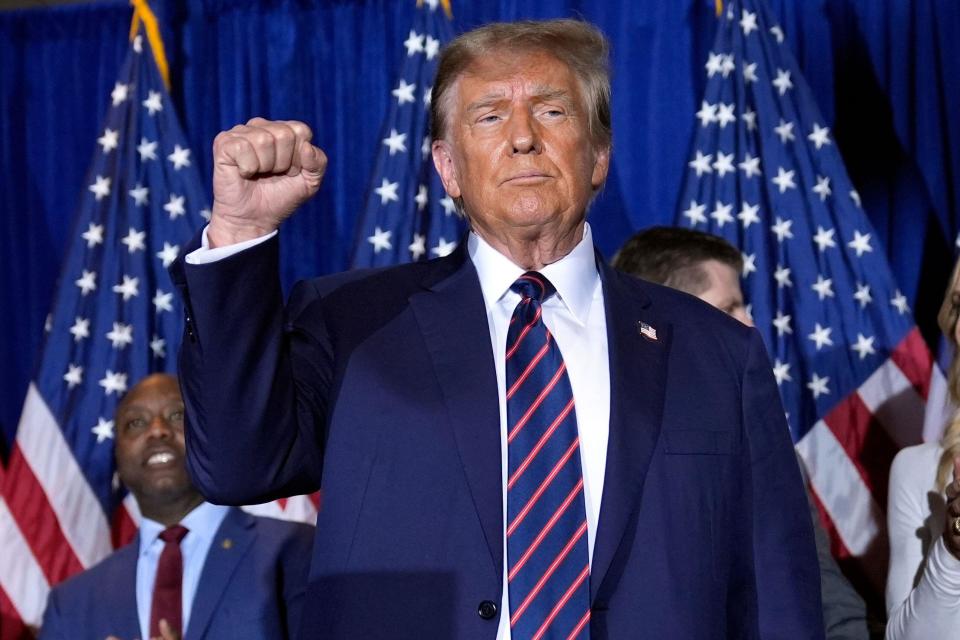 Republican presidential candidate former President Donald Trump reacts after speaking at a primary election night party in Nashua, N.H., Tuesday, Jan. 23, 2024. (AP Photo/Matt Rourke)