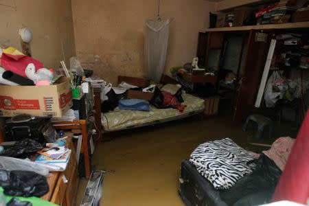 A house is filled with mud after a landslide and a flood occurred in San Juan de Lurigancho distritct, in Lima, Peru February 1, 2017. REUTERS/Guadalupe Pardo