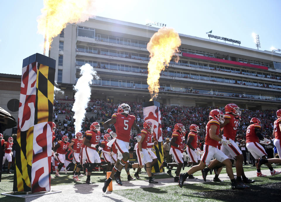 The Maryland football team takes the field for an NCAA college football game against Towson on Saturday, Sept. 2, 2023, in College Park, Md. Maryland won 38-6. (AP Photo/Steve Ruark)