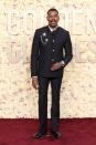 “I feel like a king tonight,” Domingo said on the Golden Globes carpet—and he certainly looked the part in a commanding Louis Vuitton look with a slight military feel and golden brooches.