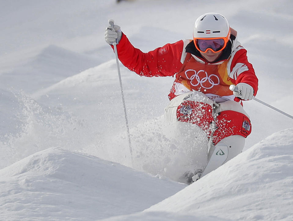 <p>Melanie Meilinger, of Austria, runs the course during the women’s moguls qualifying at the 2018 Winter Olympics in Pyeongchang, South Korea, Friday, Feb. 9, 2018. (AP Photo/Kin Cheung) </p>