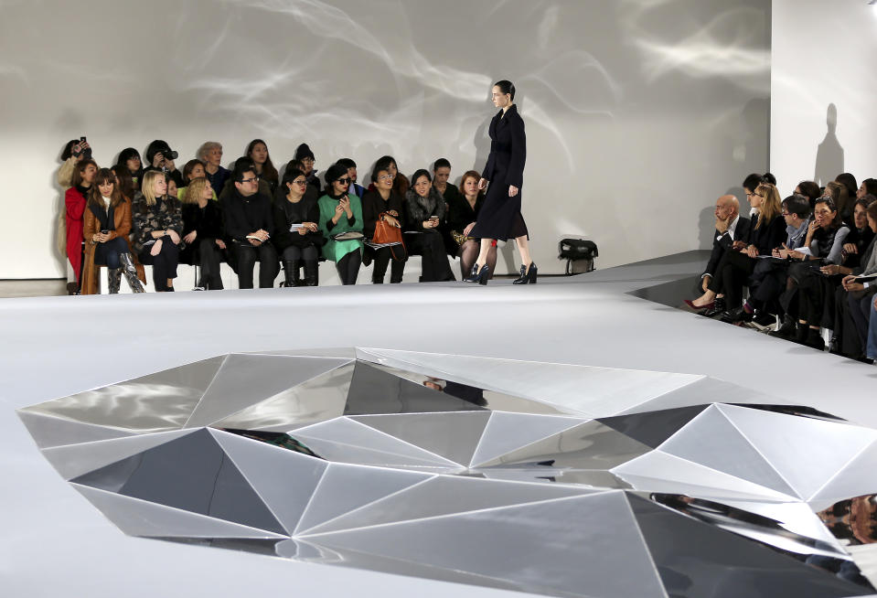 A model wears a creation for Jil Sander women's Fall-Winter 2013-14 collection, part of the Milan Fashion Week, unveiled in Milan, Italy, Saturday, Feb. 23, 2013. (AP Photo/Antonio Calanni)