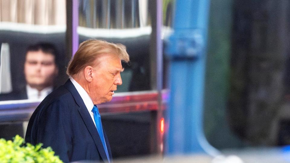 The former president leaving Trump Tower on his way to the courtroom on the third day of the trial (REUTERS)