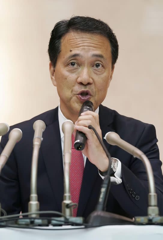 Japanese brokerage Nomura Holdings newly appointed chief executive Kentaro Okuda speaks at a news conference in Tokyo