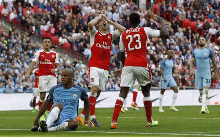 Britain Football Soccer - Arsenal v Manchester City - FA Cup Semi Final - Wembley Stadium - 23/4/17 Arsenal's Danny Welbeck and Nacho Monreal react after a missed chance Reuters / Darren Staples Livepic