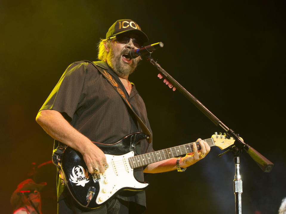 FILE - Hank Williams, Jr. performs at The BB&T Pavilion in Camden, N.J., on Aug. 19, 2017. Williams Jr. is unleashing his alter ego Thunderhead Hawkins on a new record of raunchy blues songs. “Rich White Honky Blues” shows the Country Music Hall of Famer's early influences from blues that later helped him develop his blue-collar Southern country rock sound. (Photo by Owen Sweeney/Invision/AP, File)