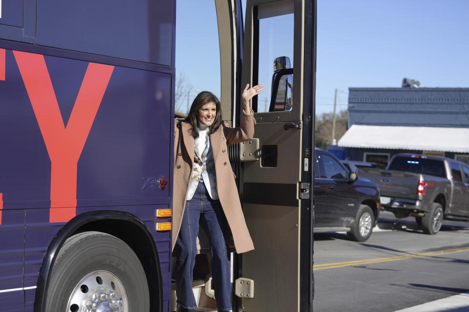 Republican presidential candidate former UN Ambassador Nikki Haley steps off of her campaign bus ahead of an event on Tuesday, Feb. 13, 2024, in her hometown of Bamberg, S.C. (AP Photo/Meg Kinnard)