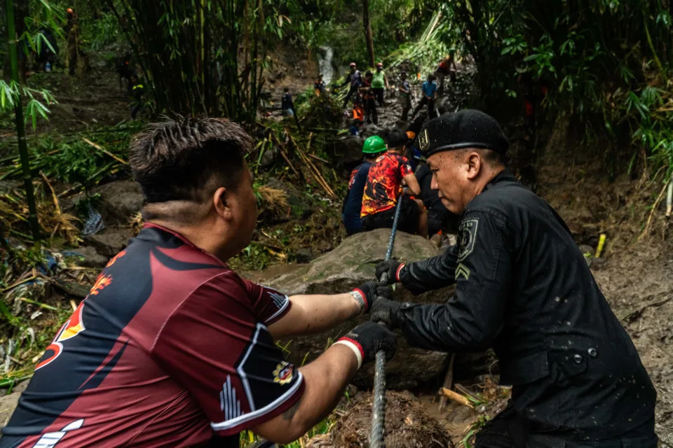 Search and rescue operations continue in Antipolo, Rizal, at the site where people may be buried following a landslide triggered by Tropical Storm Yagi (Anadolu via Getty Images)