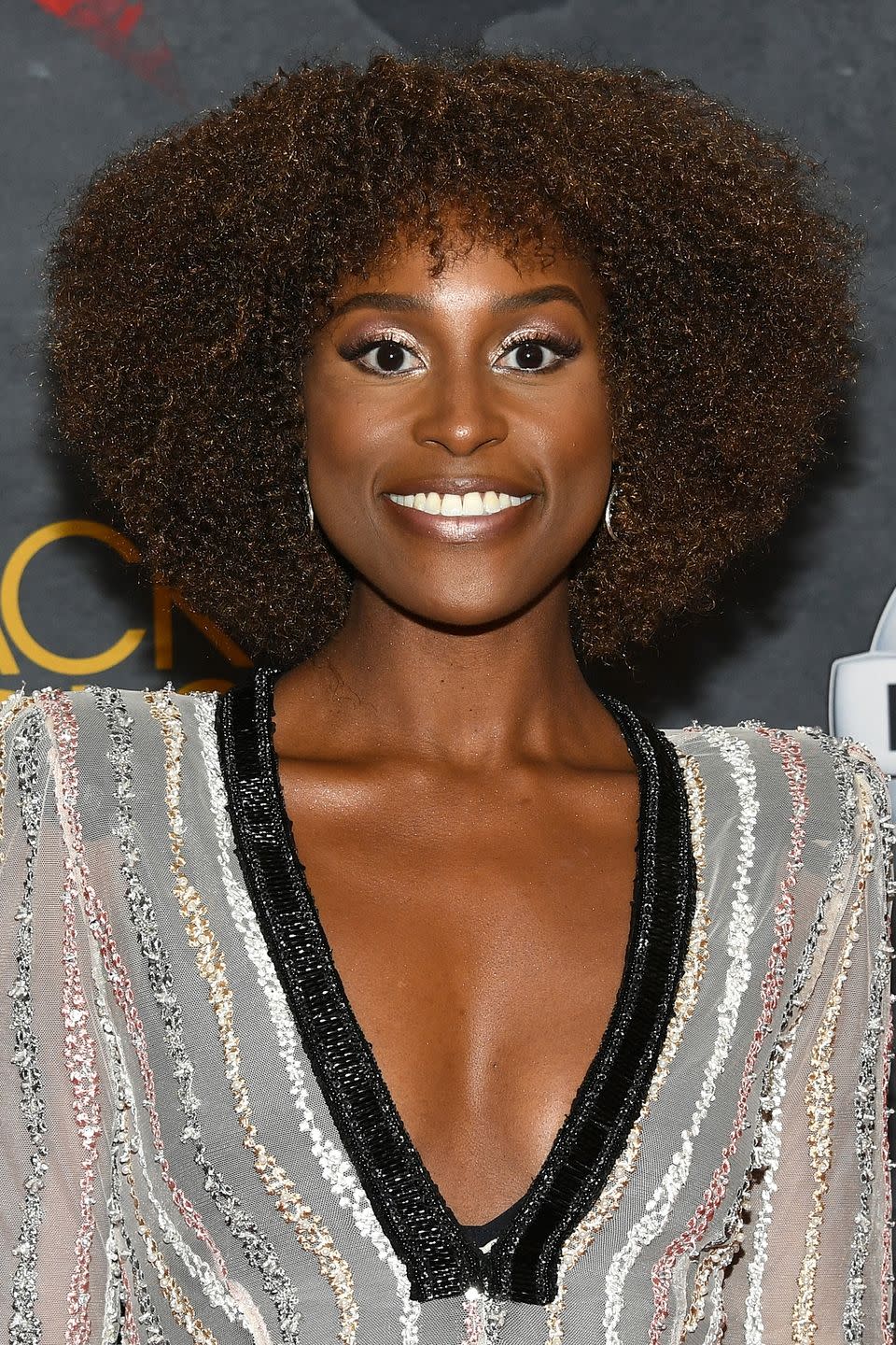 <p><strong>Issa Rae</strong>'s tight curls create a full, fabulous frame for her face. <a href="https://www.goodhousekeeping.com/beauty/hair/g33267765/types-of-bangs/" rel="nofollow noopener" target="_blank" data-ylk="slk:Bangs;elm:context_link;itc:0;sec:content-canvas" class="link ">Bangs</a> of the same texture are the perfect finishing touch.</p>