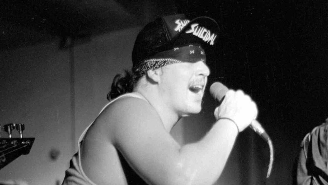  Suicidal Tendencies singer Mike Muir performing with the band in 1987. 