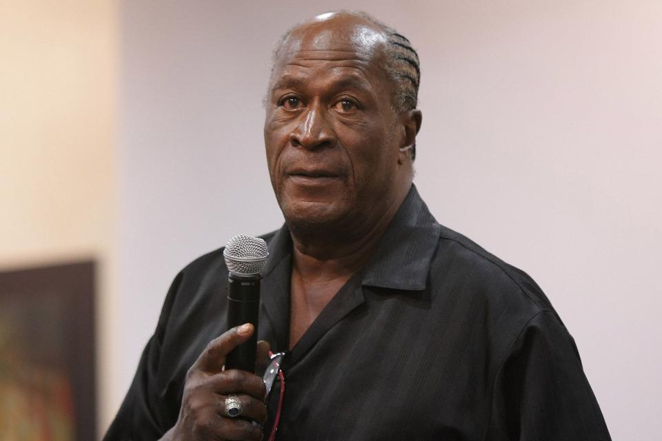 <p>Neilson Barnard/Getty</p> John Amos