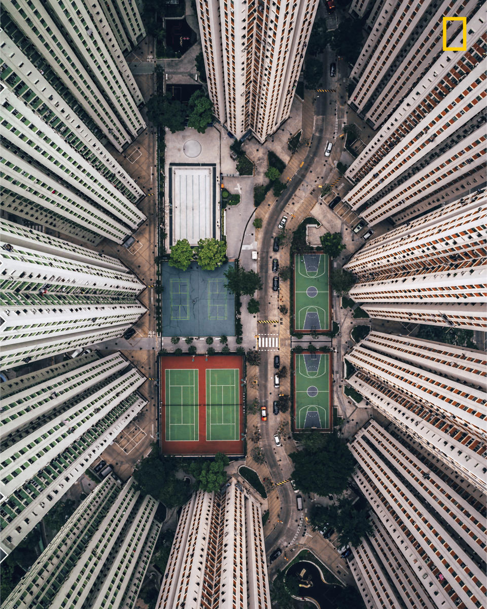 <p>Photograph and caption by Gary Cummins/National Geographic Travel Photographer of the Year Contest. — “In this photo, I tried to bring the intense and stacked living conditions that Hong Kong is famous for into perspective for the viewer. With so many people living in small spaces, it’s strange to see all these amenities empty. As a solo traveler, I’m often alone in crowds, and this photo resonates with me. I barely scratched the surface of this incredible urban environment, but this image really summarizes my experience here.” Hong Kong, China. </p>