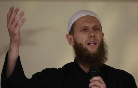 Islamist preacher Sven Lau delivers a speech during a pro-Islam demonstration in Cologne, Germany June 9, 2012. REUTERS/Ina Fassbender