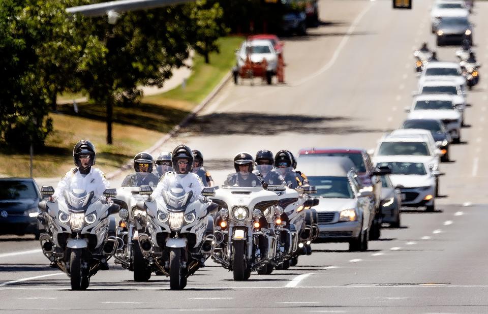 A motorcade heads north on Harrison Boulevard following the memorial service for Cpl. Steven Lewis and deputy Turner at the Dee Events Center in Ogden on Friday, July 14, 2023. Lewis and Turner were killed in a wrong-way crash near the intersection of South Weber Drive and Canyon Meadows Drive on Monday, July 3. | Laura Seitz, Deseret News