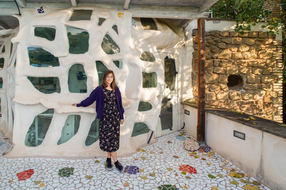 The author outside the livable sculpture Airbnb in Rome