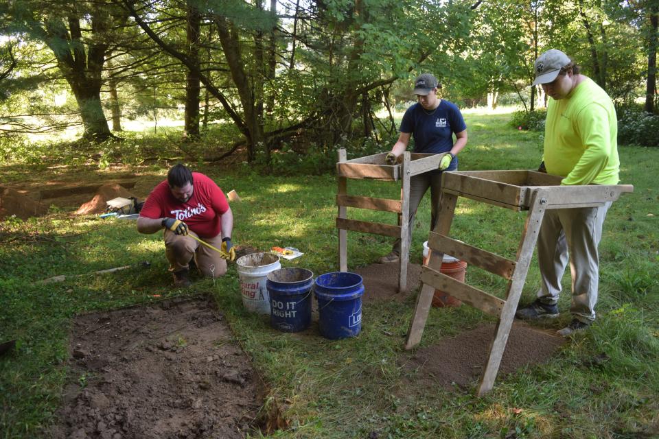 Robert Milton, Sam Meanor, Wesley Walsh of Lawhon & Associates in Columbus conduct an archaeological survey of the site where a new Thornwood Crossing roadway and roundabout will connect with Thornwood Drive, Reddington Road and River Road.