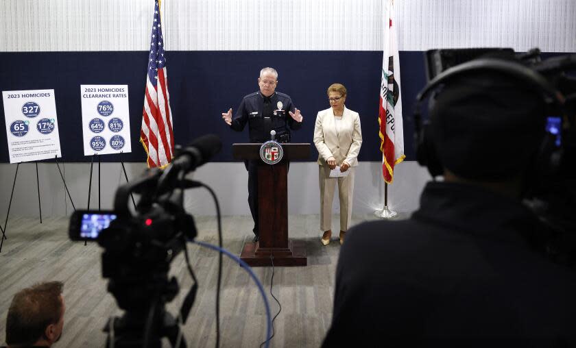 LOS ANGELES-CA-JANUARY 24, 2024: Mayor Karen Bass, right, and LAPD Chief Michel Moore hold a news conferences to discuss the 2023 crime statistics and upcoming LAPD initiatives at LAPD headquarters in downtown Los Angeles on January 24, 2024. (Christina House / Los Angeles Times)