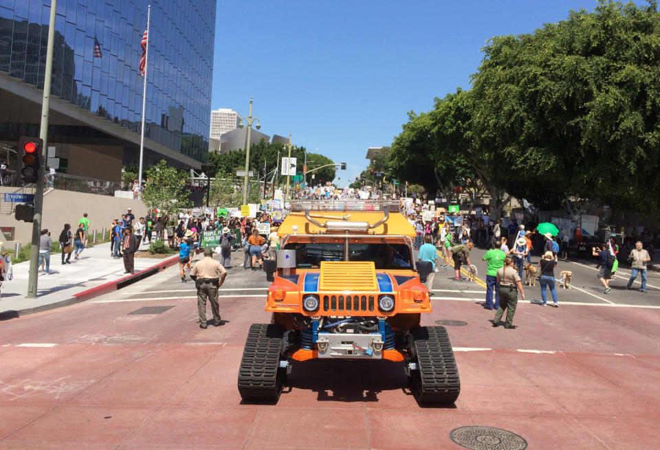 Two electric-powered Hummers, created by the production company Drive Around the World, led the March for Science Los Angeles on April 22, 2017. <cite>Calla Cofield/Space.com</cite>