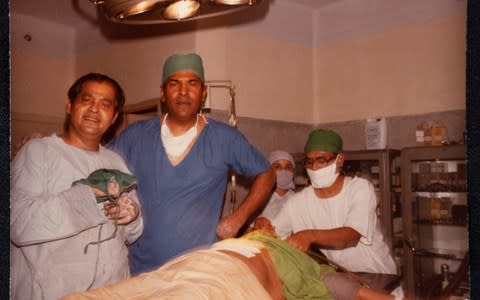 Dr Chakrabarti in theatre in India circa 1982 - Credit: Andrew Crowley