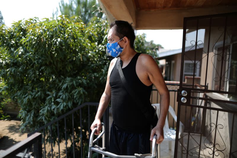 Francisco Garcia, 31, who spent almost four months in hospital with coronavirus disease (COVID-19), recovers at his home in Los Angeles