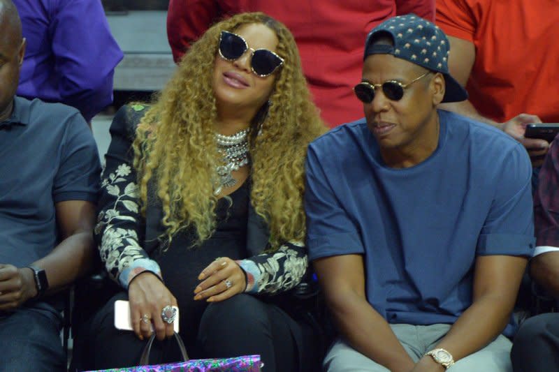 Beyoncé and Jay Z sit courtside as they attend Game 7 of the best-of-seven first round playoffs between the Los Angeles Clippers and the Utah Jazz at Staples Center in Los Angeles in 2017. File Photo by Jim Ruymen/UPI