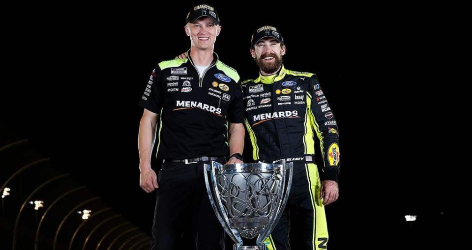 Crew chief Jonathan Hassler celebrates with Ryan Blaney after they claimed the 2023 Cup Series championship at Phoenix Raceway