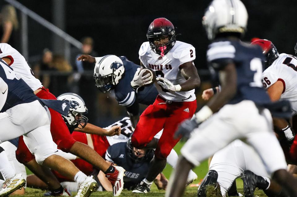 Austin Clemons breaks through the line of scrimmage for a big gain in a game at Portal on Sept. 15, 2023.