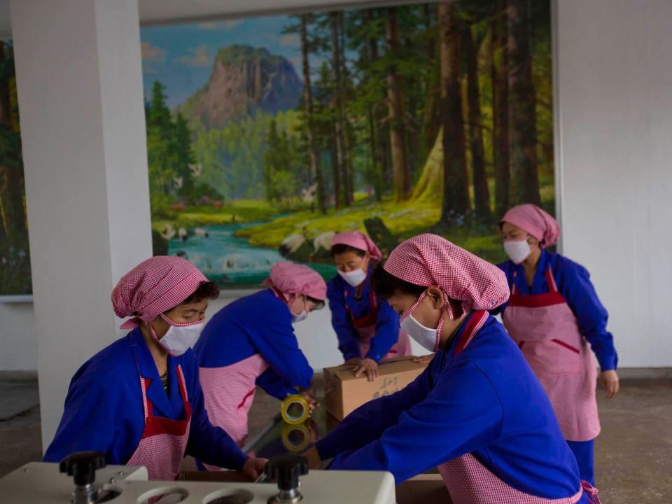 North Korean women package soap at a cosmetics factory in Pyongyang, North Korea, on Saturday, Jan. 12, 2013.