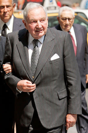 FILE PHOTO -- David Rockefeller arrives at the funeral service for New York socialite and philanthropist Brooke Astor at St. Thomas Church in New York, August 17, 2007. REUTERS/Jeff Zelevansky/File Photo