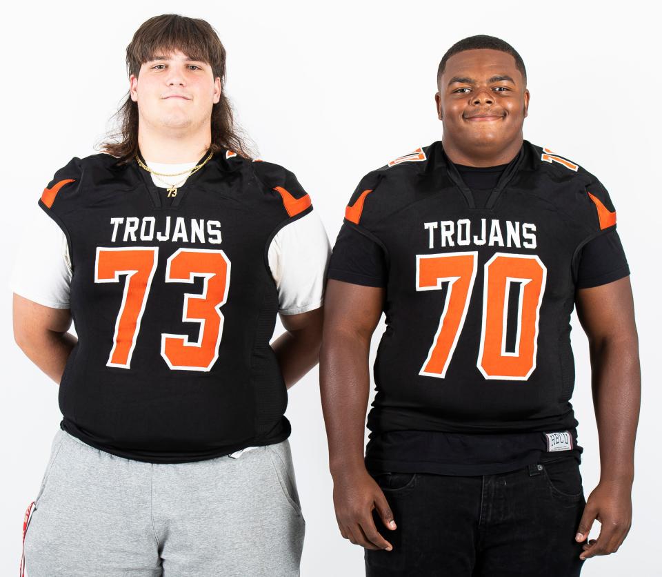 York Suburban football players Dylan Hopwood (73) and  Jalen Lee (70) pose for a photo during YAIAA football media day on Tuesday, August 1, 2023, in York. 