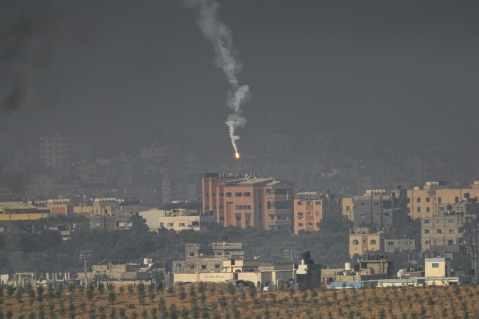 An Israeli army flare is seen over the northern part of the Gaza Strip, as seen from southern Israel, Wednesday, Nov. 1, 2023. (AP Photo/Ariel Schalit)