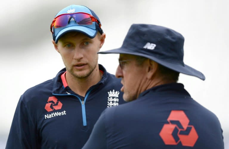 England captain Joe Root (left) and coach Trevor Bayliss talk during a training session at The Oval, in London, on July 26, 2017